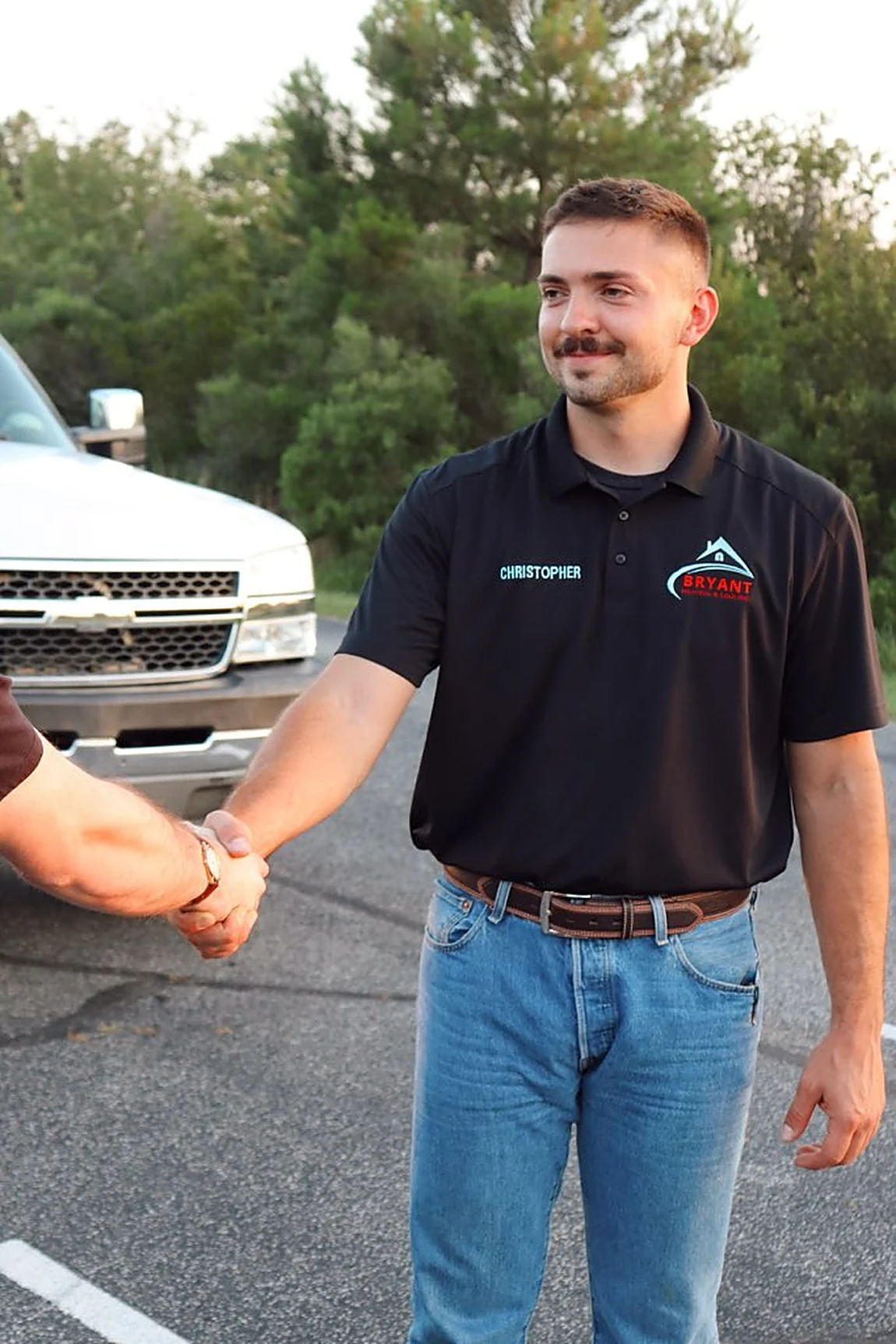 Christopher Bryant greeting a customer — Bryant Heating and Cooling, Indian Trail NC